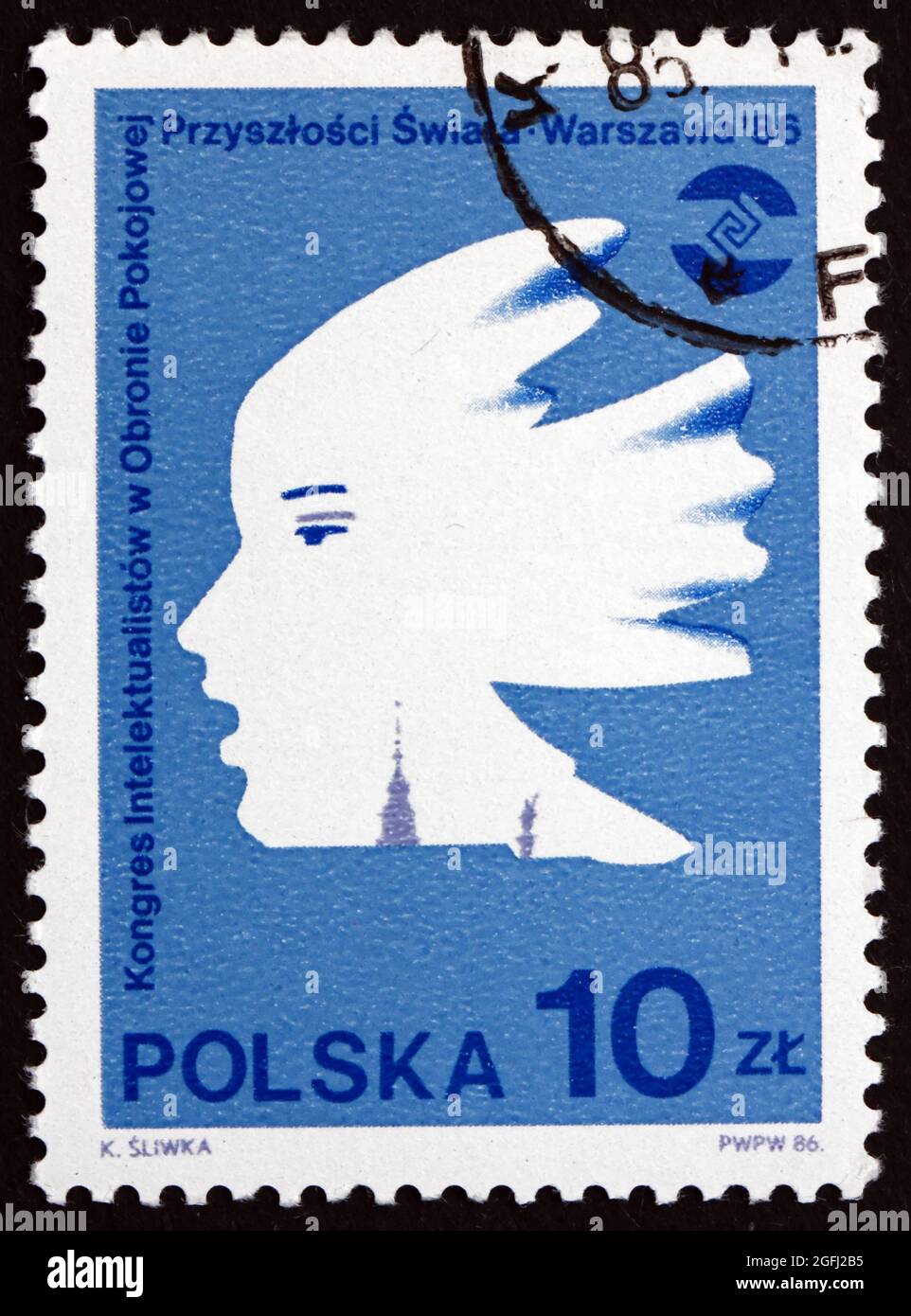 POLONIA - CIRCA 1986: Un francobollo stampato in Polonia mostra Profilo, emblema, Congresso degli intellettuali per la Pace Mondiale, Varsavia, circa 1986 Foto Stock