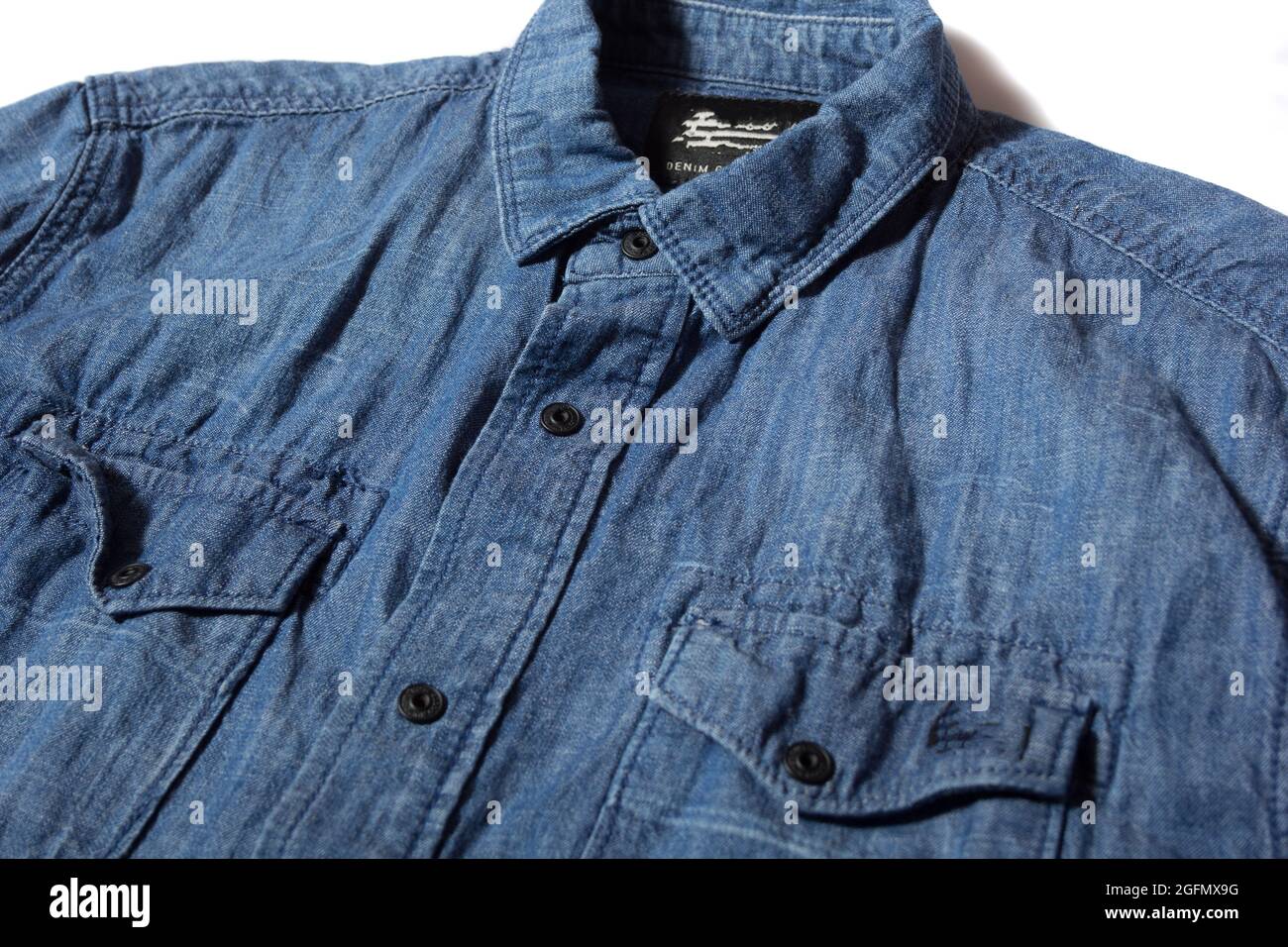 Camicia in denim blu Foto Stock