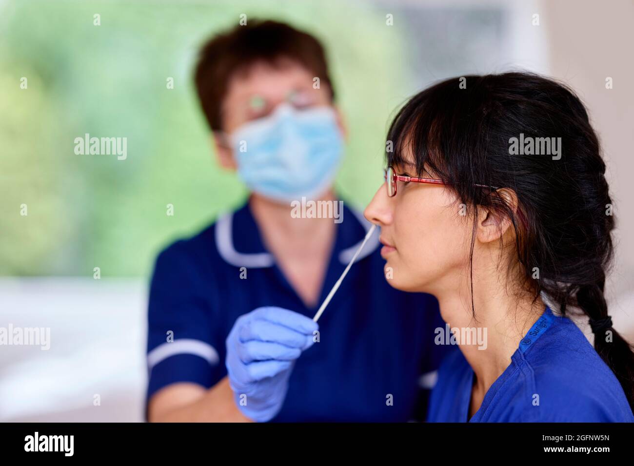 Test PCR infermiere Foto Stock