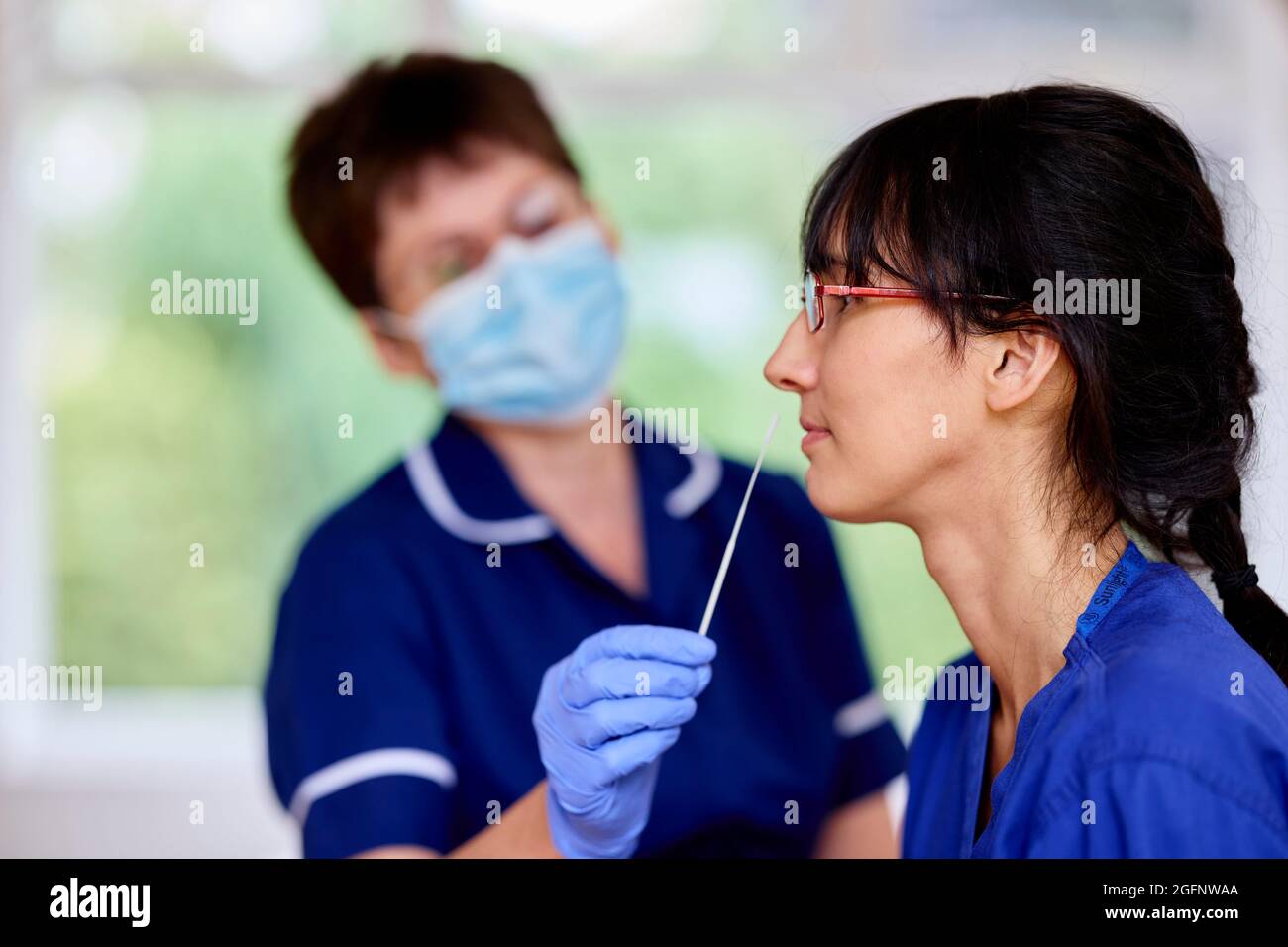 Test PCR infermiere Foto Stock