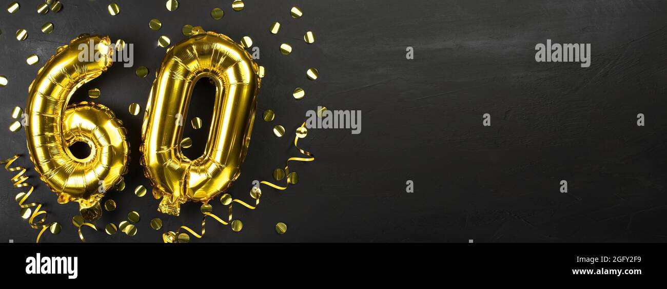 Uomo ispanico con numero 60 palloncini al compleanno partito Foto stock -  Alamy