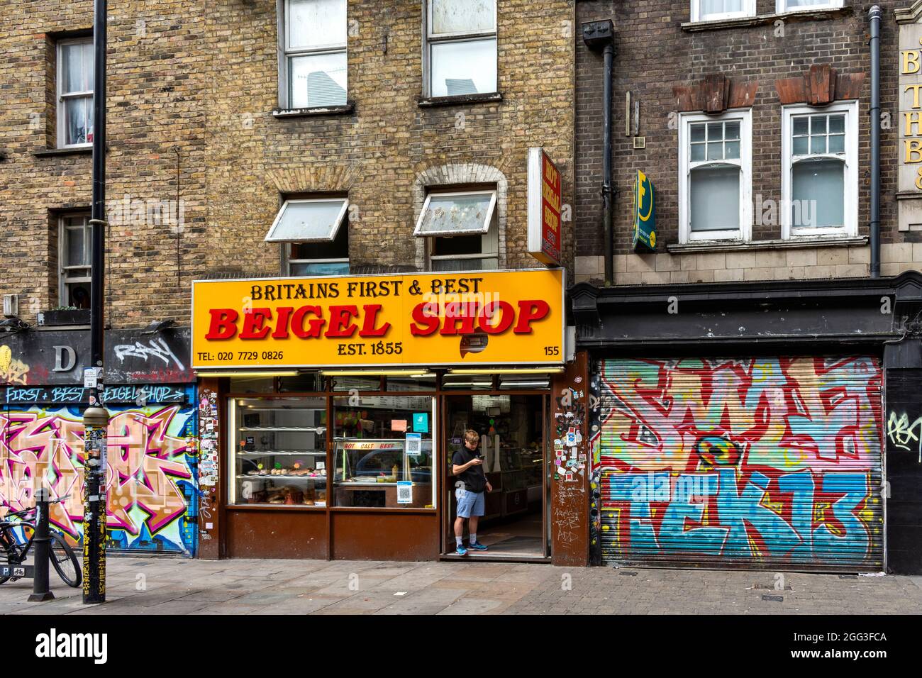 AREA ARTISTICA E CULTURALE DI LONDRA INTORNO A MATTONE LANE BRITAINS FIRST E BEST BEIGEL SHOP Foto Stock