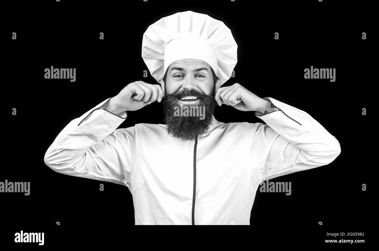 Cuoci cappello. Cuoco, cuochi o panettiere con bearded. Cuochi maschi bearded isolati su nero. Chef divertente con cuoco per la barba. Barba e baffi che indossano grembiule Foto Stock