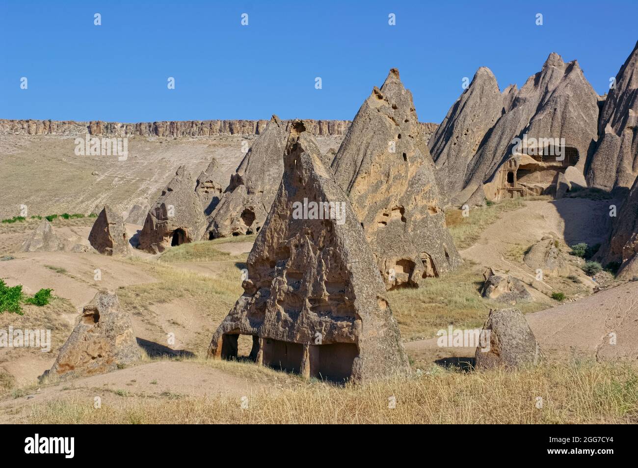 Pietra miliare della natura e del turismo in Turchia Fairy Chimneys con pietra-scavata grotta casa a Selime-Yaprakhisar Foto Stock