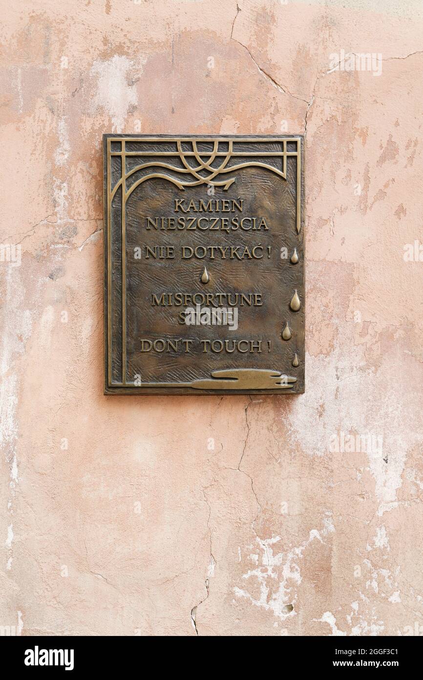 La pietra della sfortuna nella città vecchia di Lublino, in Polonia Foto Stock