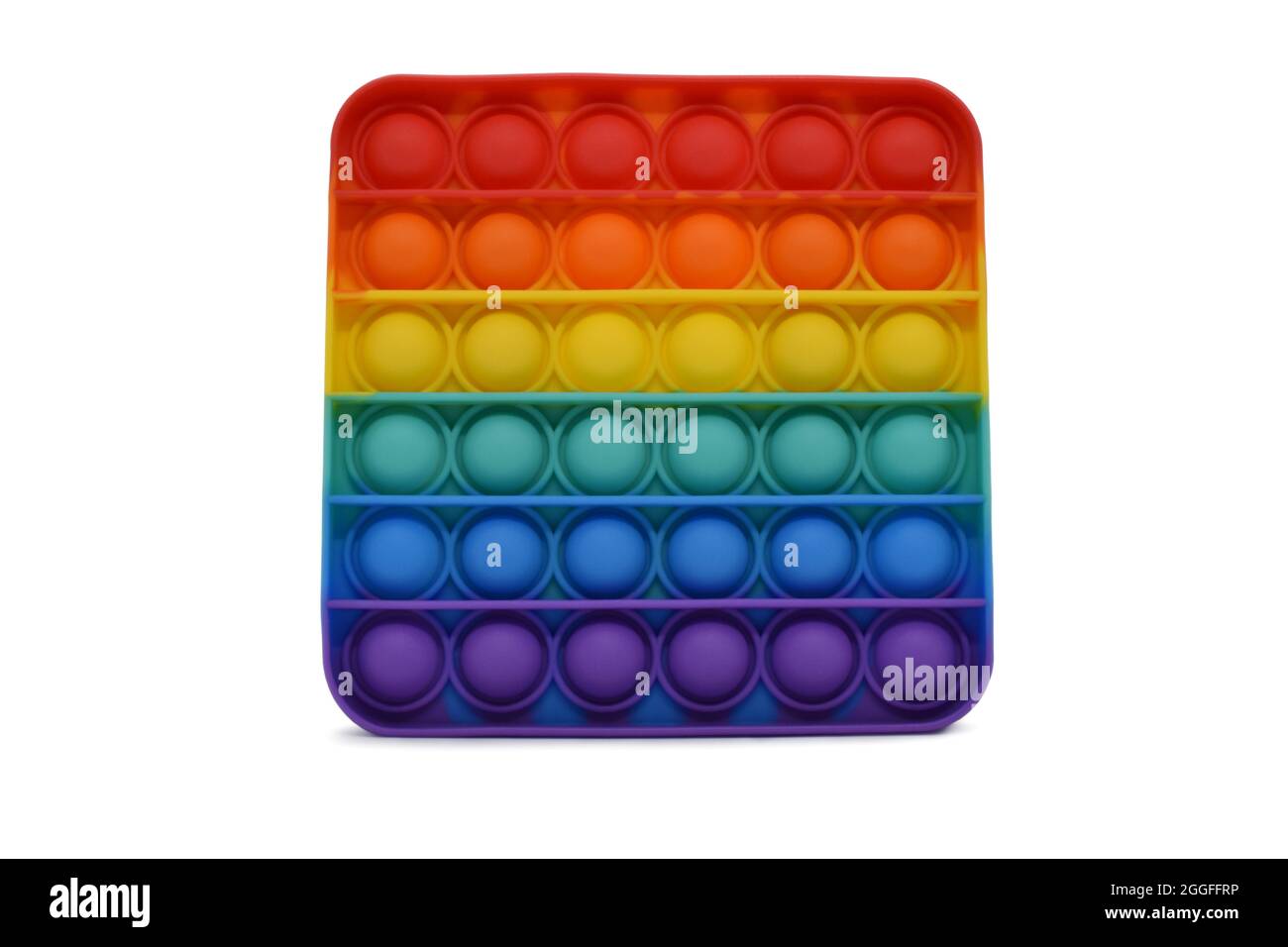 Simple Dimple Pop IT colorato giocattolo antistress. Silicone sensoriale ircobaleno fidget isolato su sfondo bianco Foto Stock