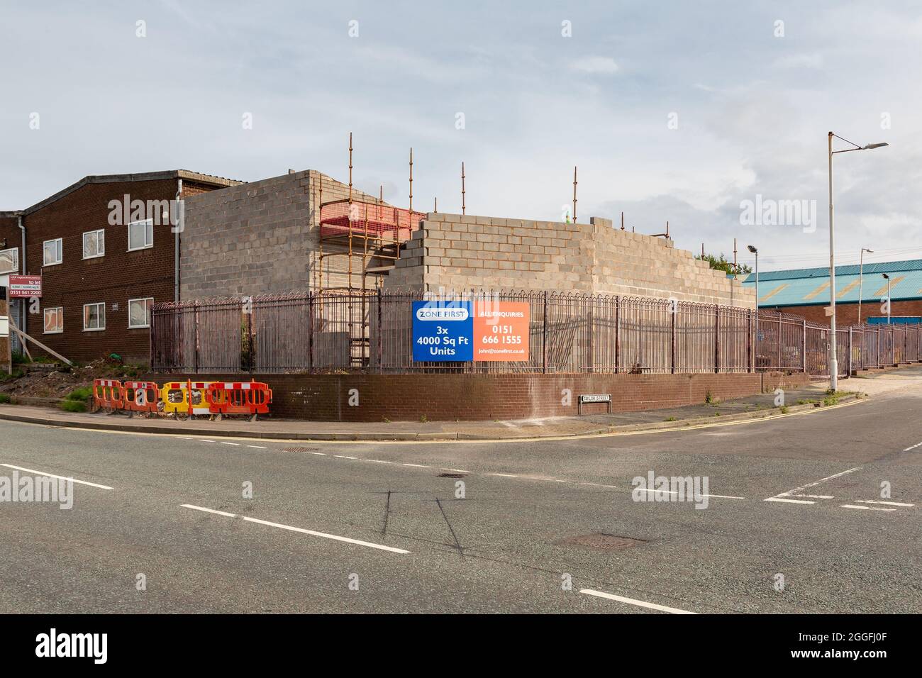 Birkenhead, Regno Unito: Cantiere edile all'incrocio tra Canning Street e Taylor Street, presso la direzione della prima struttura della zona. Foto Stock
