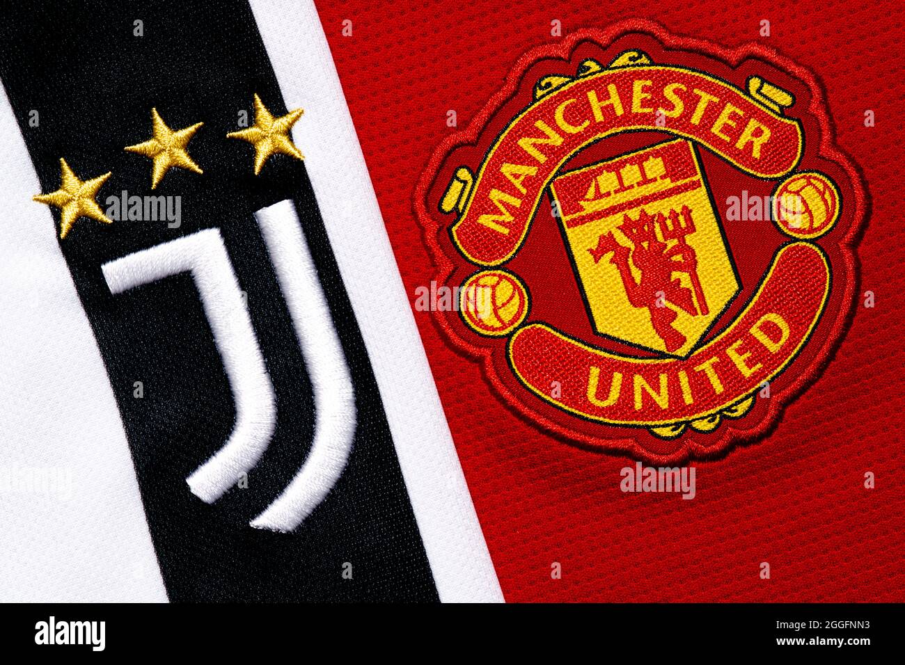 Primo piano dello stemma del Manchester United & Juventus club. Foto Stock