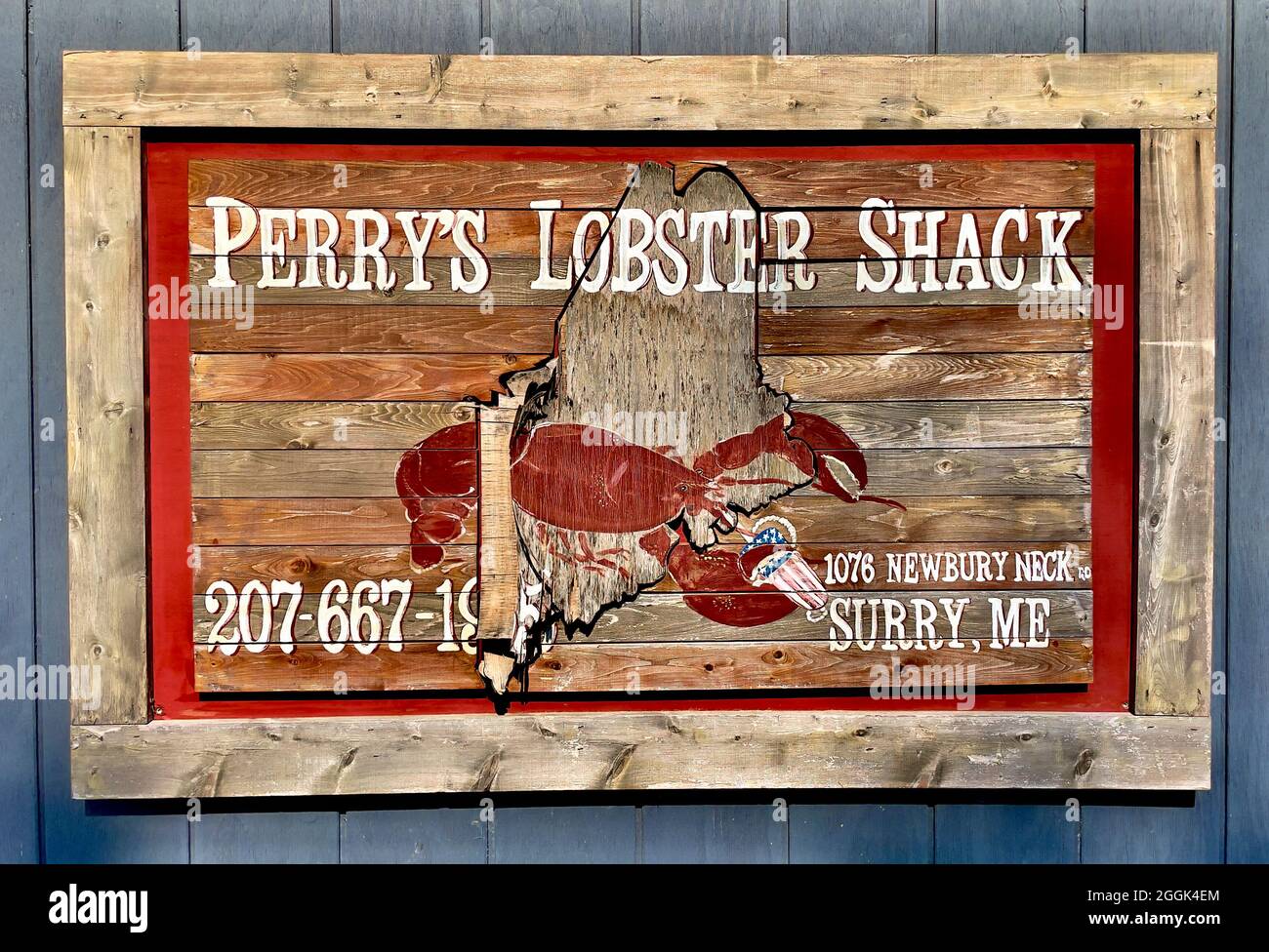 Cartello in legno per il tempo Perry’s Lobster Shack è un baracca a basso contenuto d’acqua che offre aragoste e piatti di pesce insieme a sostanziosi contorni e birre. Foto Stock