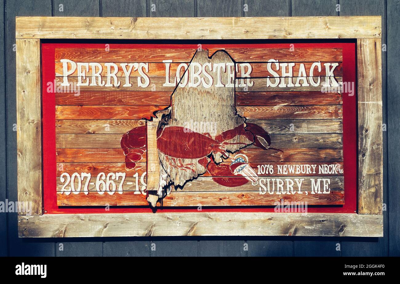 Cartello in legno per il tempo Perry’s Lobster Shack è un baracca a basso contenuto d’acqua che offre aragoste e piatti di pesce insieme a sostanziosi contorni e birre. Foto Stock