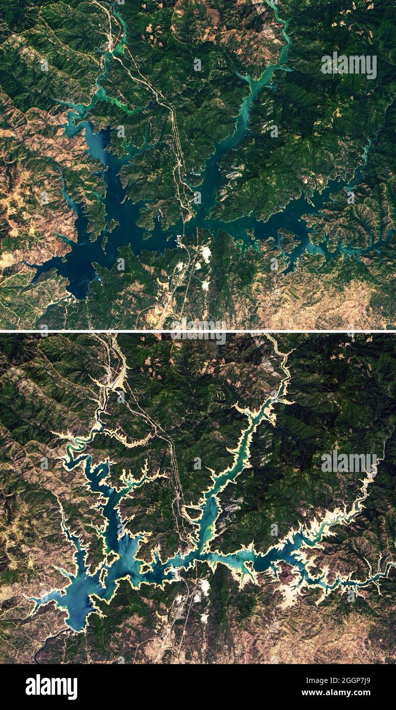 Queste immagini del lago Shasta della California, il più grande bacino idrico dello stato, sono state catturate dalla Operational Land Imager (oli) su Landsat 8 il 13 luglio 2019 (in alto) e il 16 giugno 2021 (in basso). Foto Stock
