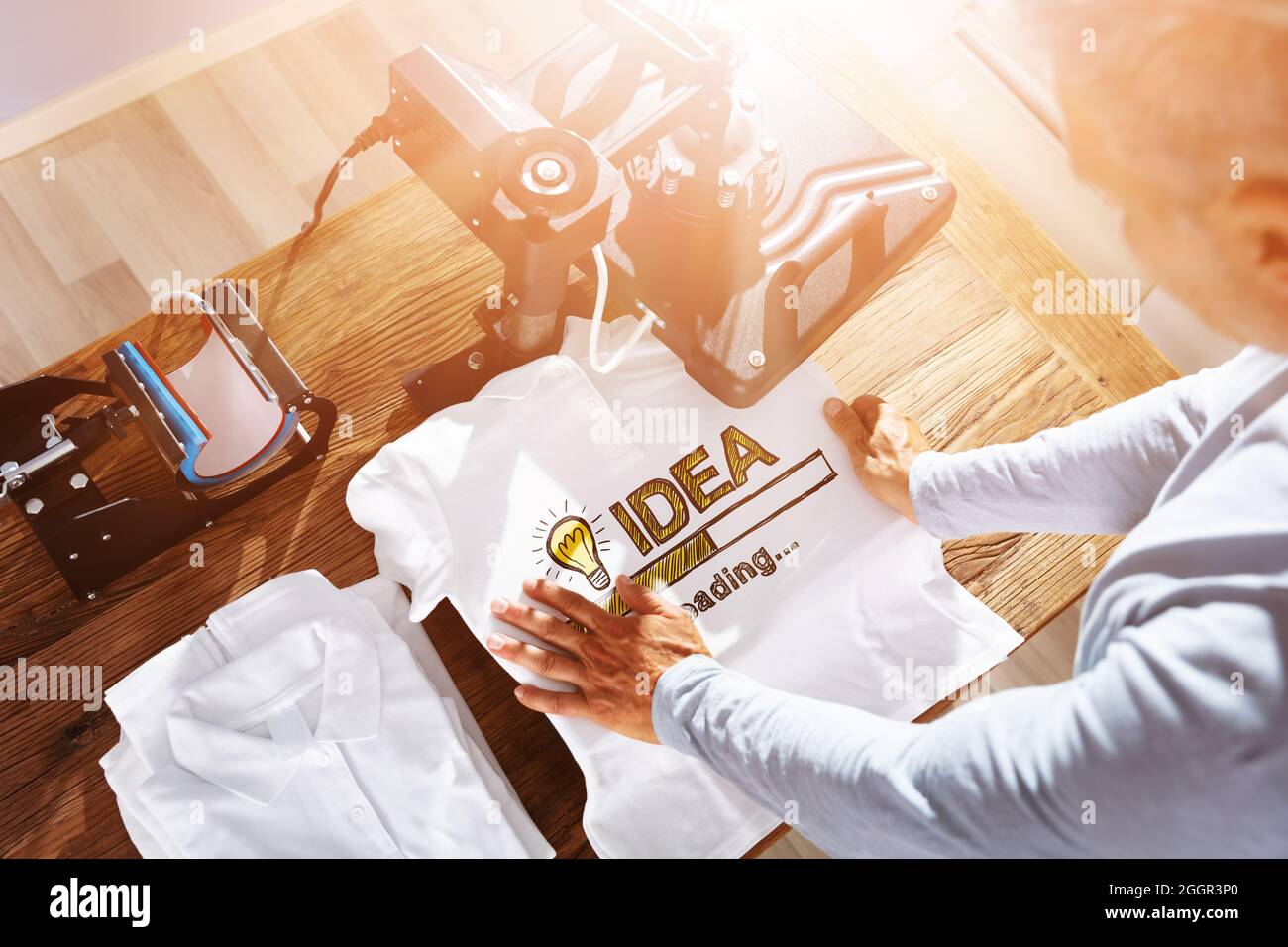 TShirt Print con la macchina per la stampa termica. Stampa di magliette Foto Stock