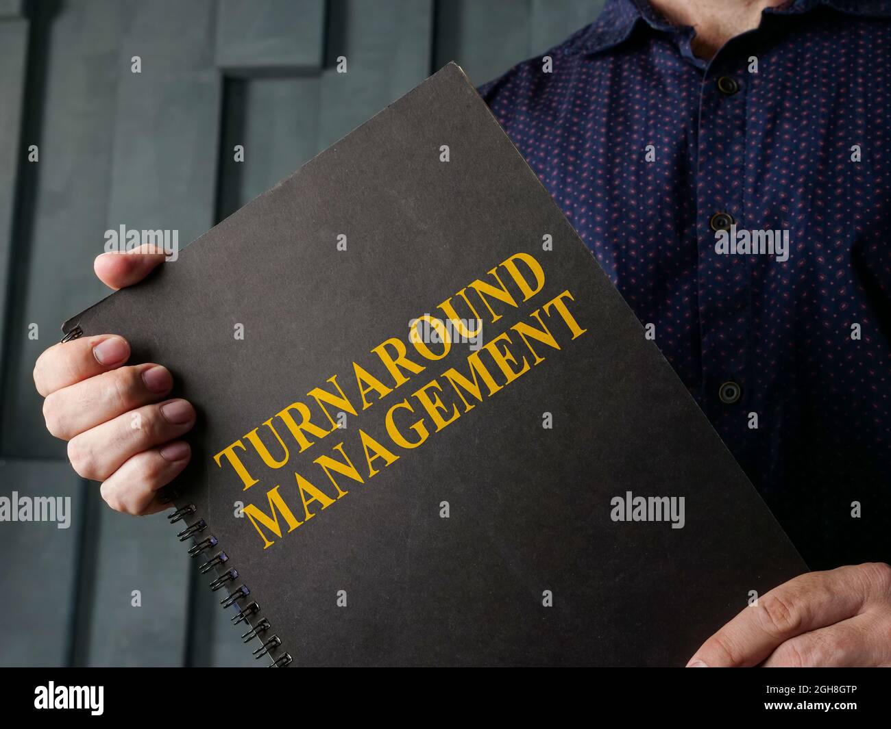 Guida alla gestione dei turnaround nelle mani del manager. Foto Stock
