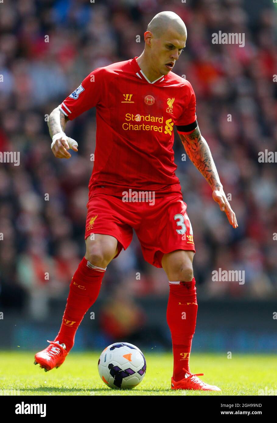 Martin Skrtel di Liverpool in azione durante la partita della Barclays Premier League tra Liverpool e Manchester City all'Anfield Stadium di Liverpool il 13 aprile 2014. Foto Stock