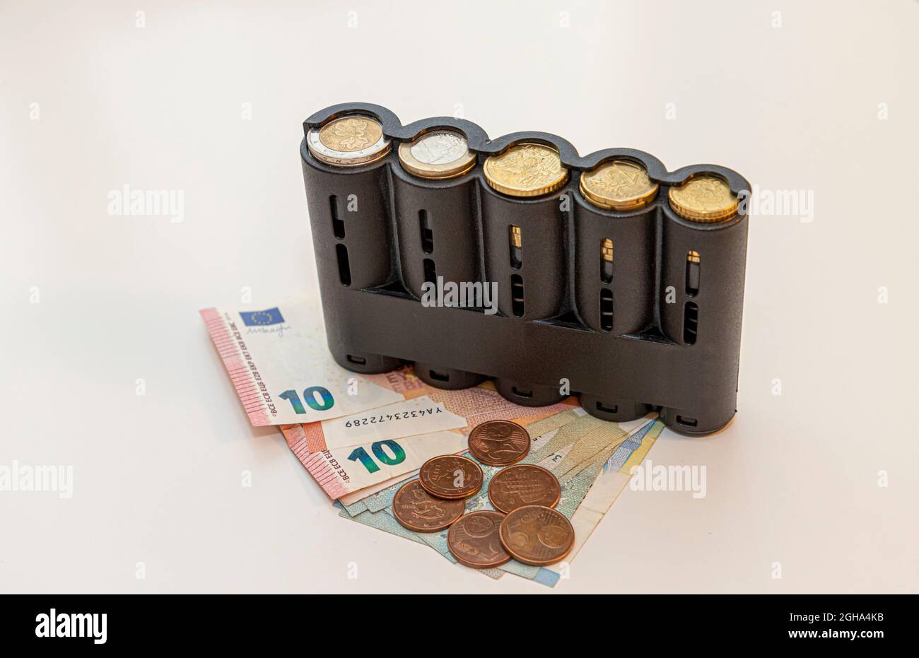 Portamonete in euro a molla, monete e banconote Foto stock - Alamy