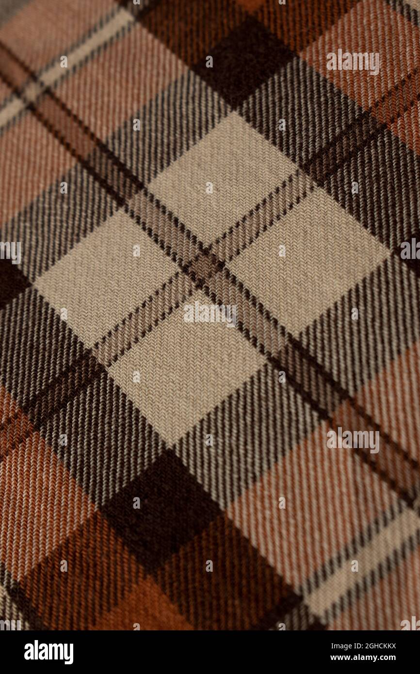 Primo piano dello sfondo marrone della camicia a quadri Foto Stock