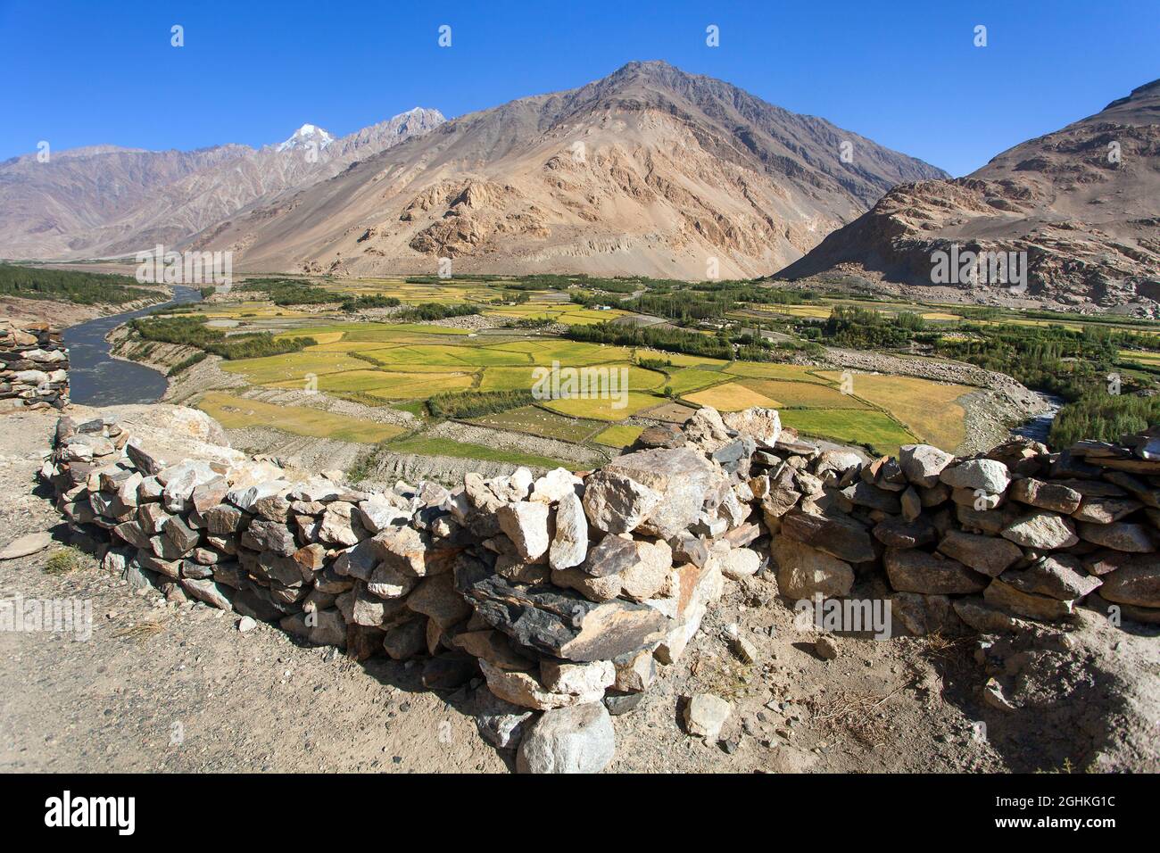 Campi aroun fiume Panj, Gorno-Badakhshan, Hindukush montagne Tagikistan e confine con l'Afghanistan, Wakhan corridoio Foto Stock