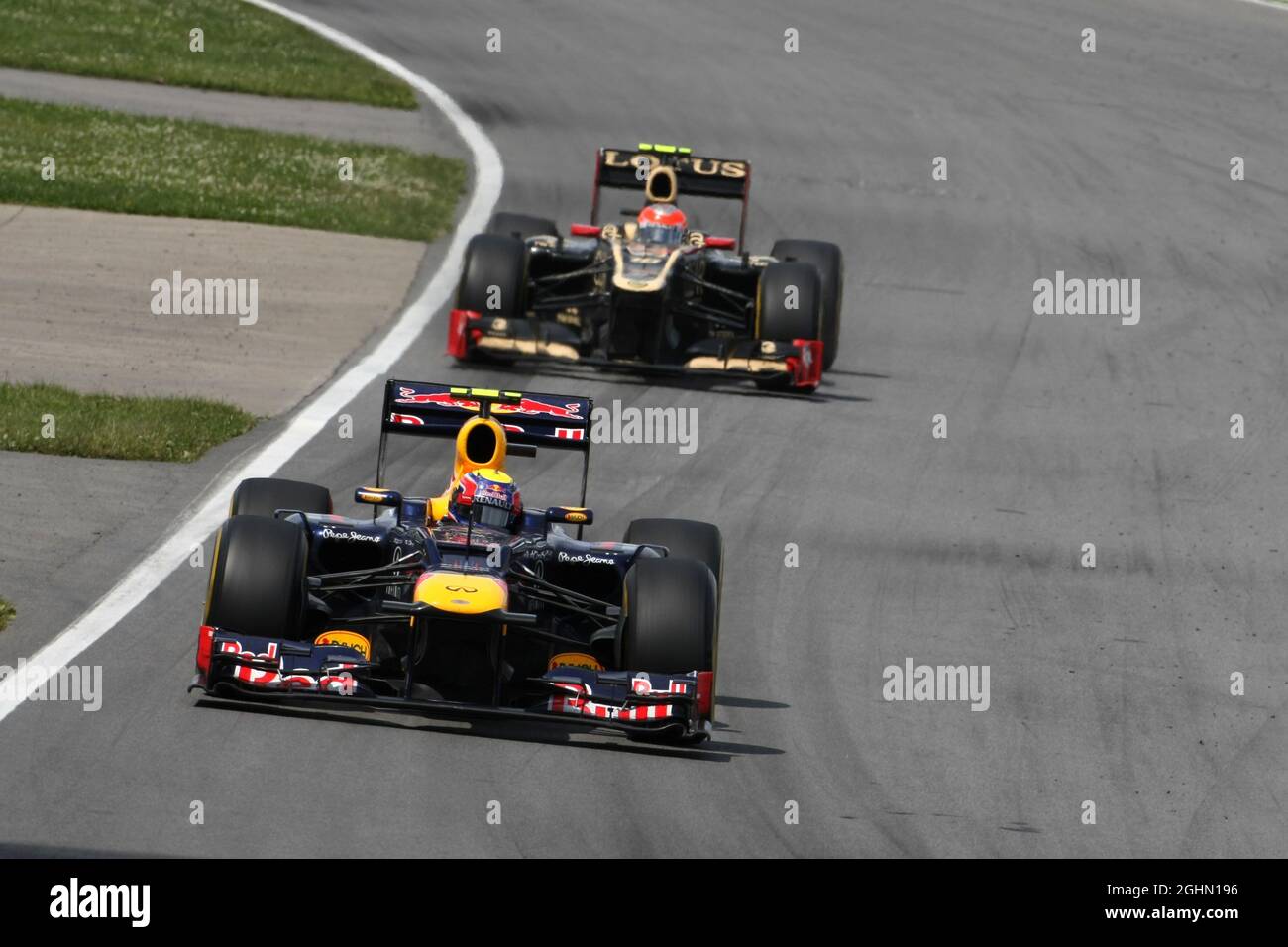 Mark Webber (AUS), Red Bull Racing e Romain Grosjean (fra), Lotus F1 Team 10.06.2012. Formula 1 World Championship, Rd 7, Canadian Grand Prix, Montreal, Canada, Giorno di gara Foto Stock