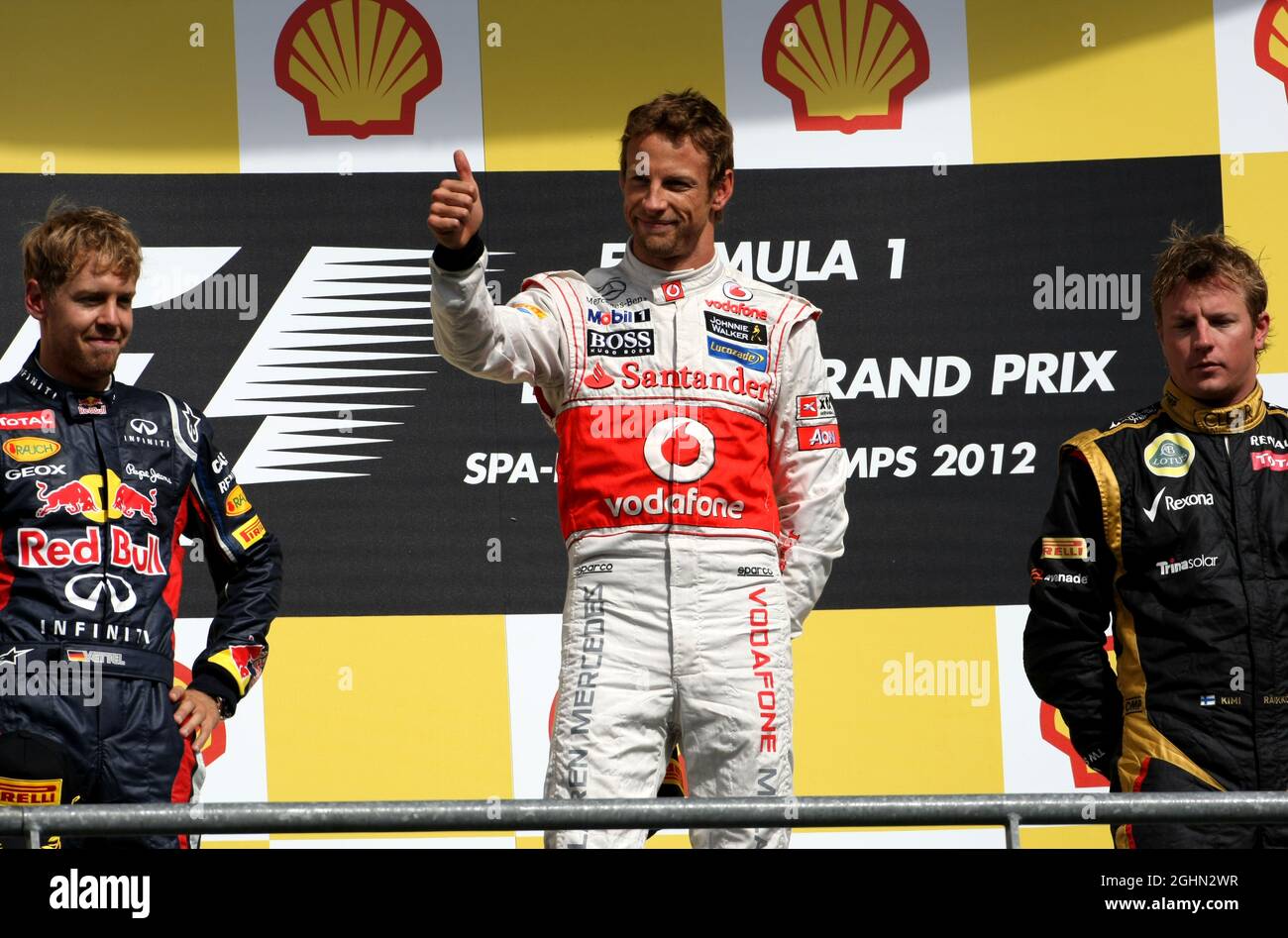 Sebastian Vettel (GER), Red Bull Racing, Jenson Button (GBR), McLaren Mercedes e Kimi Raikkonen (fin), Lotus F1 Team 02.09.2012. Formula 1 World Championship, Rd 12, Gran Premio del Belgio, Spa Francorchamps, Belgio, Giorno di gara Foto Stock
