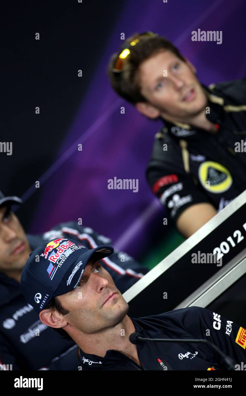 Mark Webber (AUS) Red Bull Racing e Romain Grosjean (fra) Lotus F1 Team nella FIA Press Conference. 11.10.2012. Formula 1 World Championship, Rd 16, Gran Premio di Corea, Yeongam, Corea del Sud, Giorno di preparazione. Foto Stock