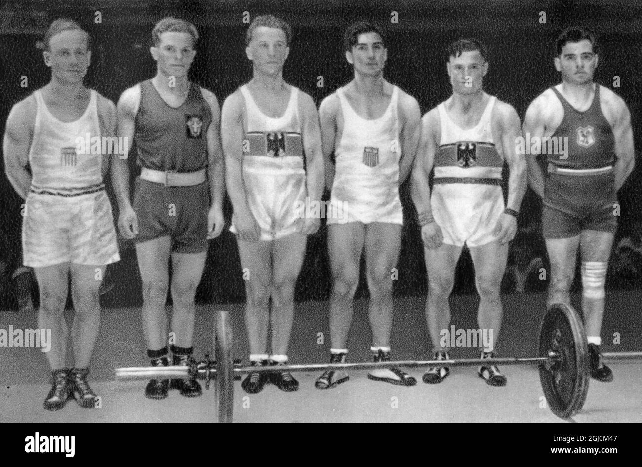 Weightlifting 1932 Giochi Olimpici, Los Angeles, USA, Weatherweight weightlifters oro Raymond Suvigny per la Francia Argento Hans Wölpert per la Germania Bronze Anthony Tellezzo per gli USA Foto Stock