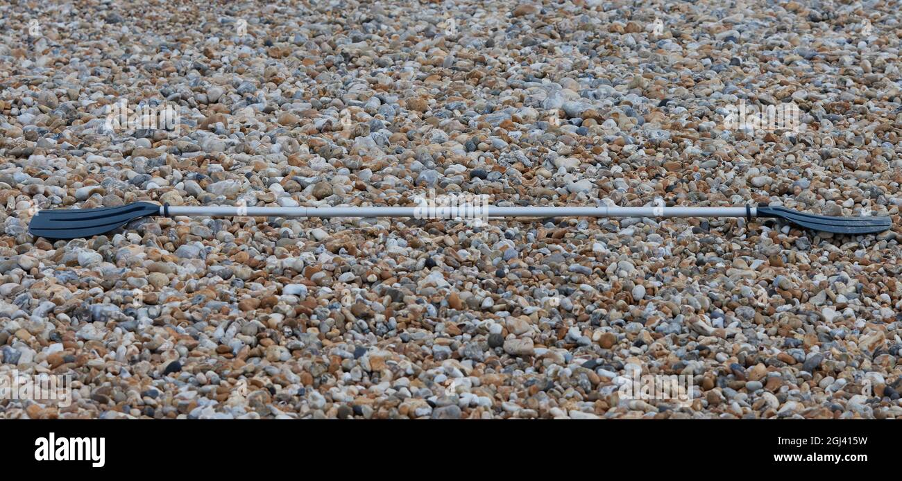 Pagaie sulla spiaggia. Foto Stock