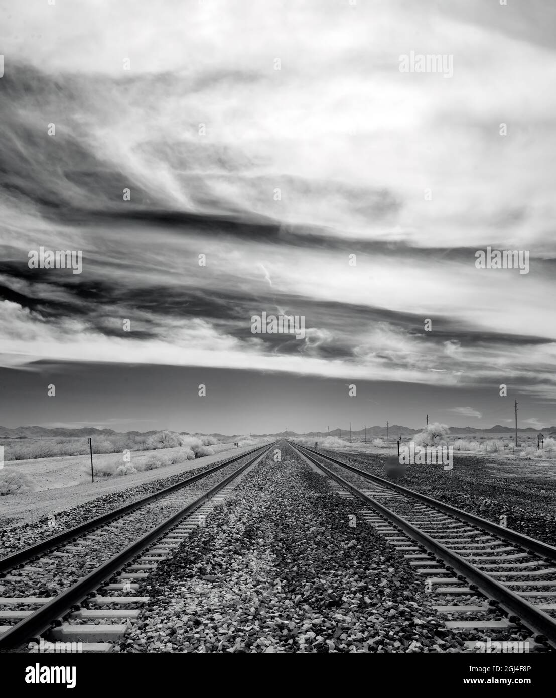 Binari ferroviari che conducono via Foto Stock