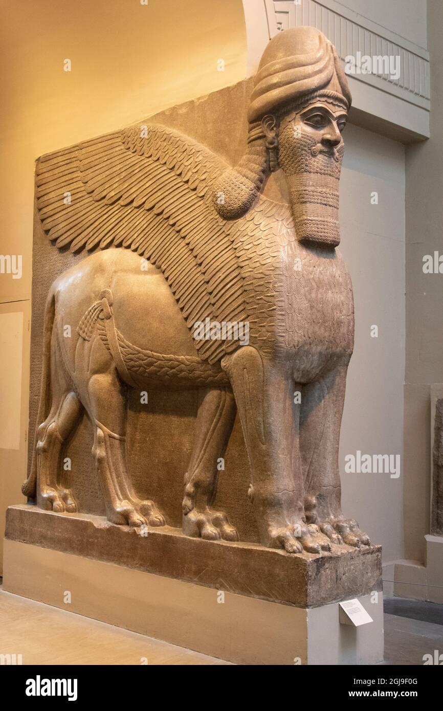 Esempio del toro della testa umana alata assira che serviva da guardiani delle antiche porte assire. Foto Stock