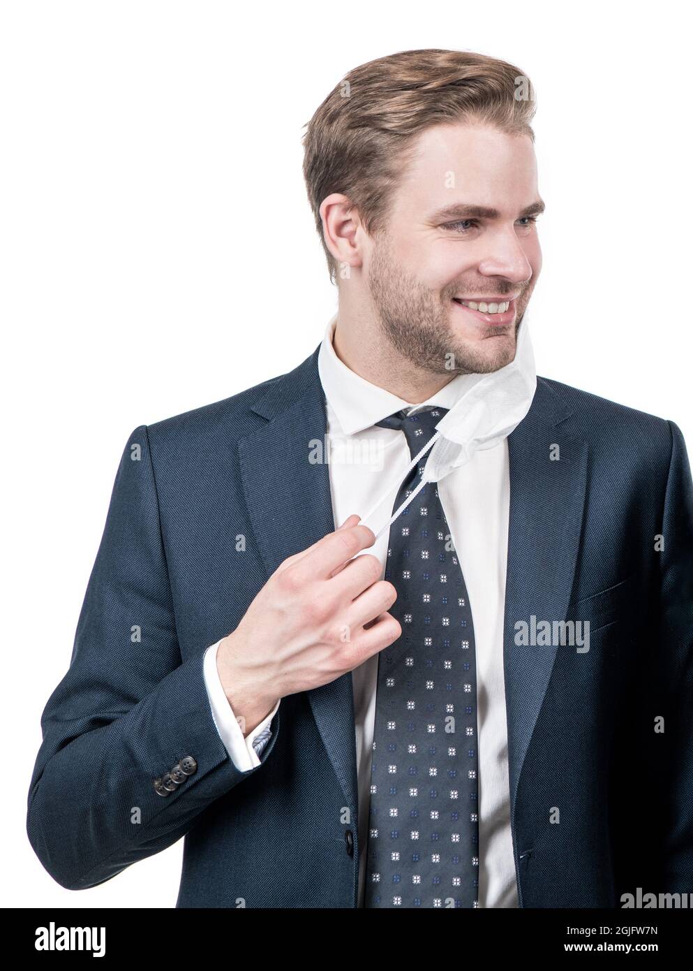 Im non ha paura. L'uomo felice take off maschera. Uomo professionale sorriso in abbigliamento formale. Sorridente avvocato Foto Stock