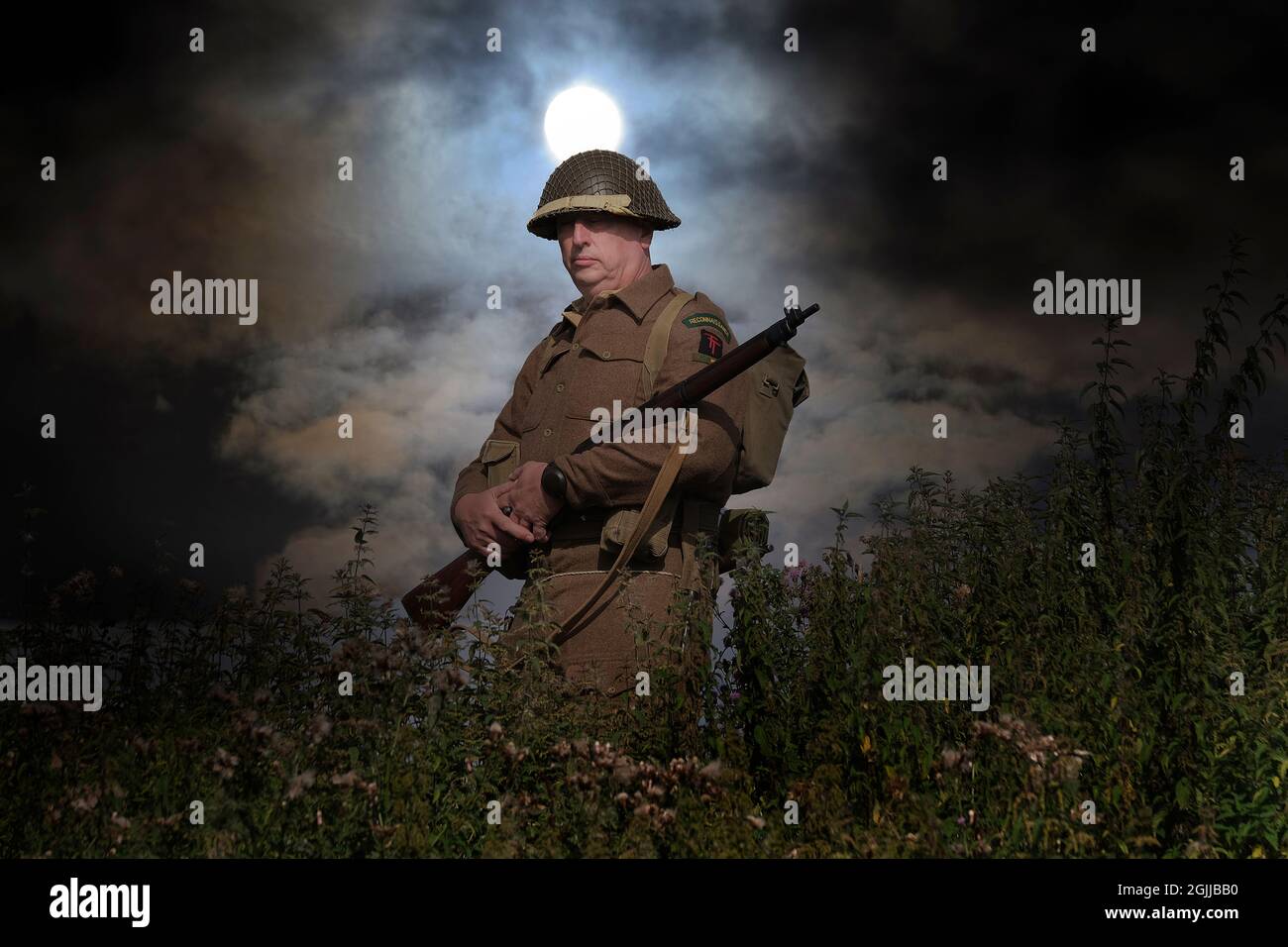 Enactors vestito in seconda guerra mondiale British uniforme scena battaglia e stile di vita scene. Foto Stock