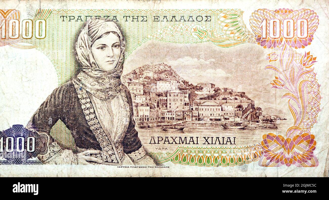 Lato opposto di 1000 mille Drachmas greco Drachmai moneta di banconota emessa $1970 in Grecia caratterizza una donna, una ragazza in costume locale e Hydra è Foto Stock