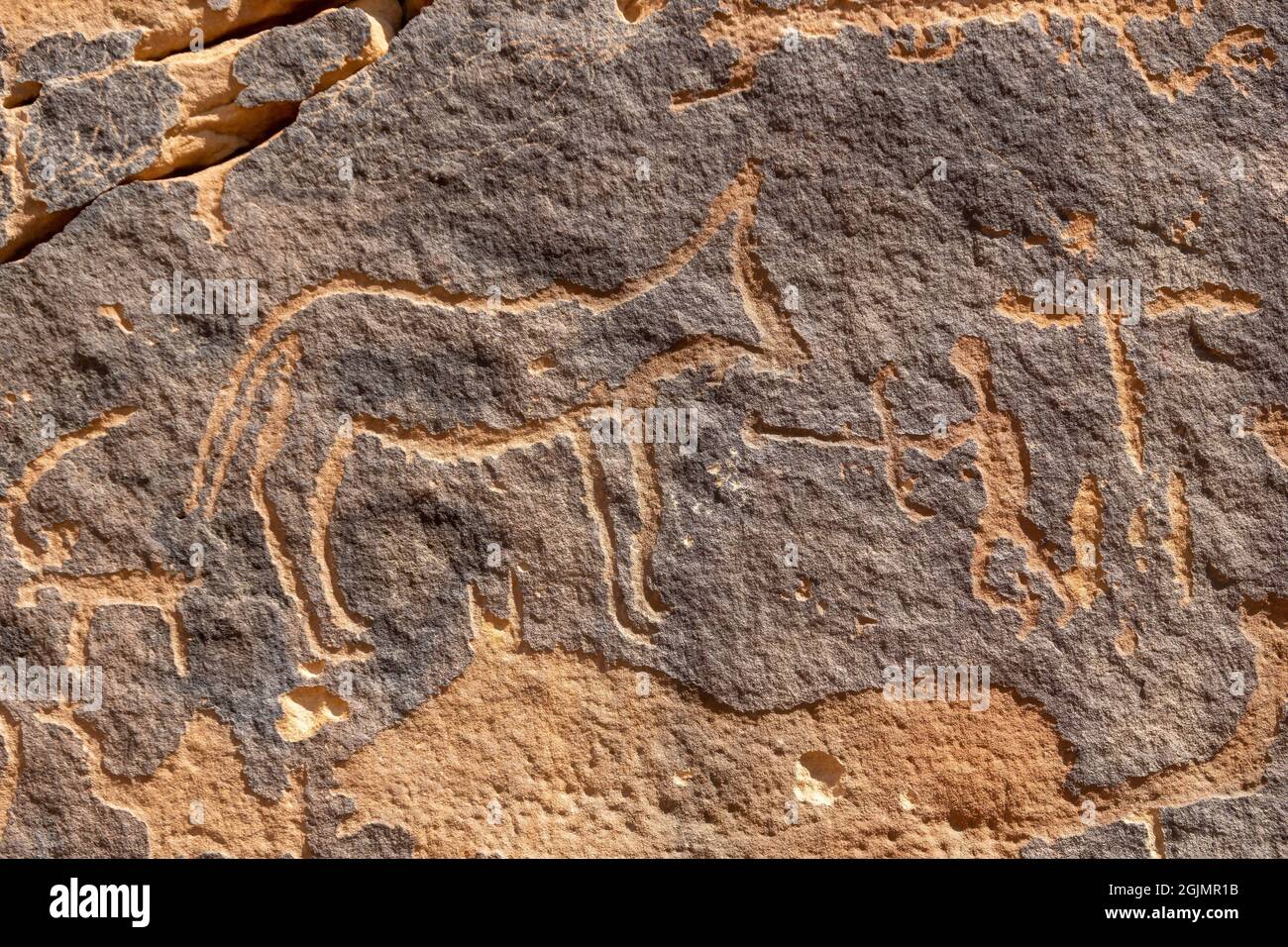 Una scena di caccia raffigurante un arciere, Graffiti Rocks (Qaryat al Aamba), Musayqirah, Provincia di Riyadh, Arabia Saudita Foto Stock