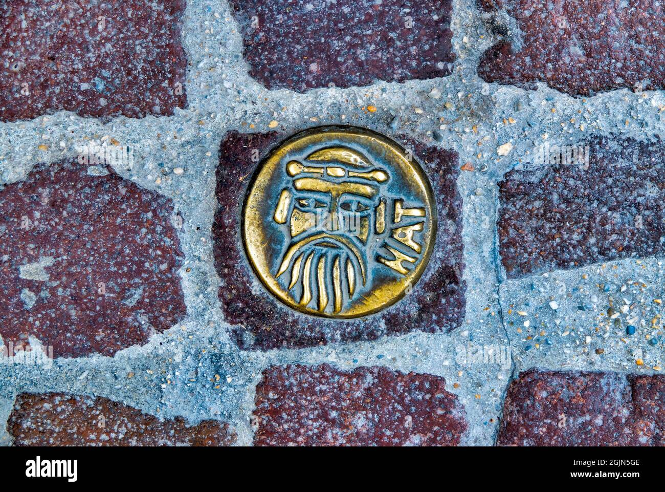 Targa commemorativa della moneta pre-romana chiamata CAPPELLO ad Atri, Italia Foto Stock