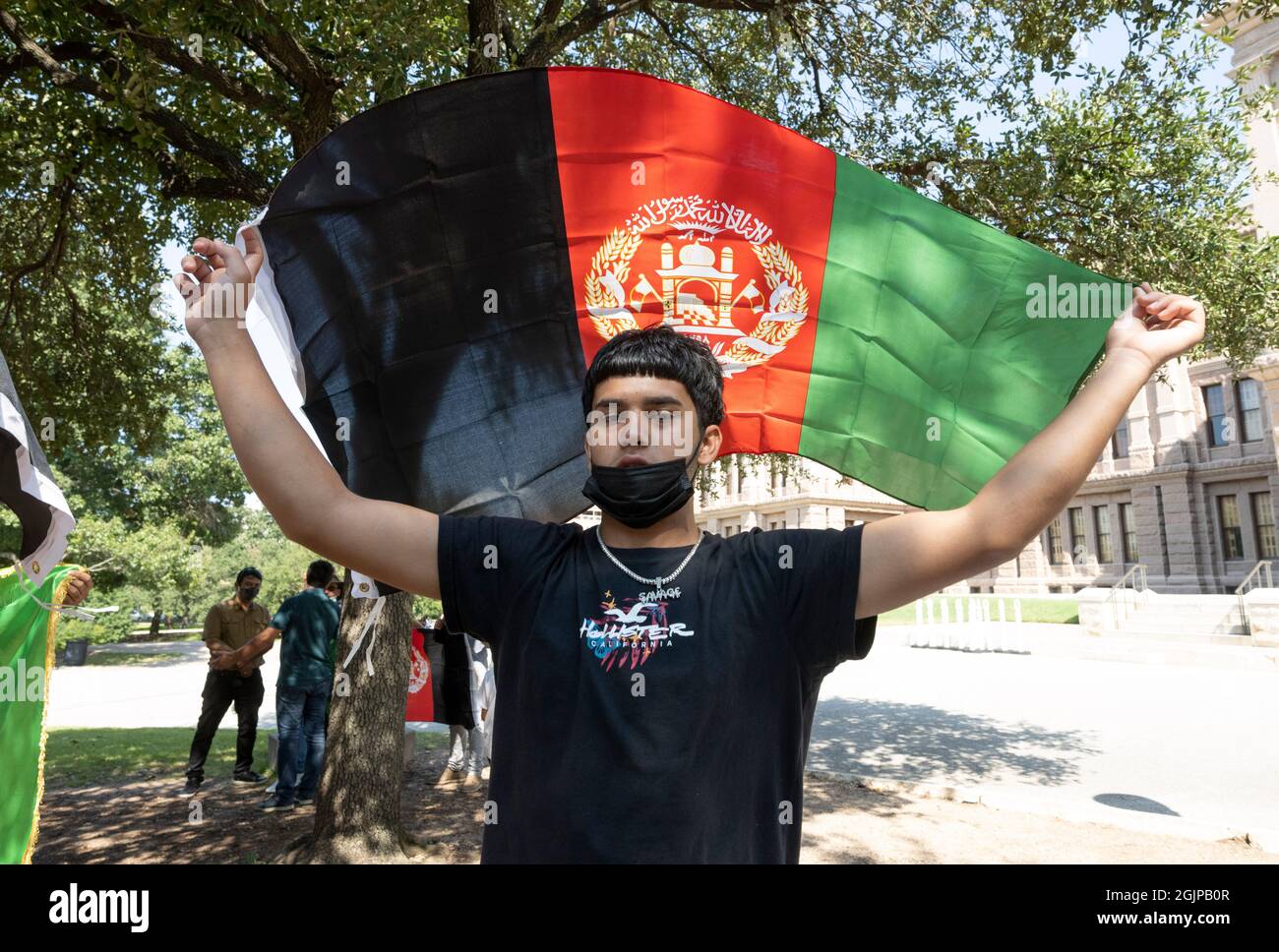 Austin Texas USA, 11 settembre 2021: Nel 20° anniversario degli attacchi terroristici dell'11 settembre contro l'America, circa un centinaio di ex afghani che vivono nel Texas centrale si radunano al Campidoglio dello Stato per denunciare il governo dei talebani e le minacce terroristiche dal Pakistan. Gli oratori hanno sottolineato la continua minaccia per le donne afghane sotto l'attuale regime talebano. Credit: Bob Daemmrich/Alamy Live News Foto Stock