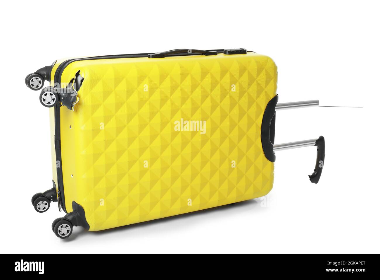 Valigia in plastica gialla con maniglia rotta e ruota isolata su bianco  Foto stock - Alamy