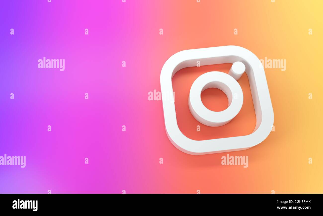 Logo Instagram con spazio per testo e grafica nella vista dall'alto. Sfondo arcobaleno. Rendering 3d. Foto Stock
