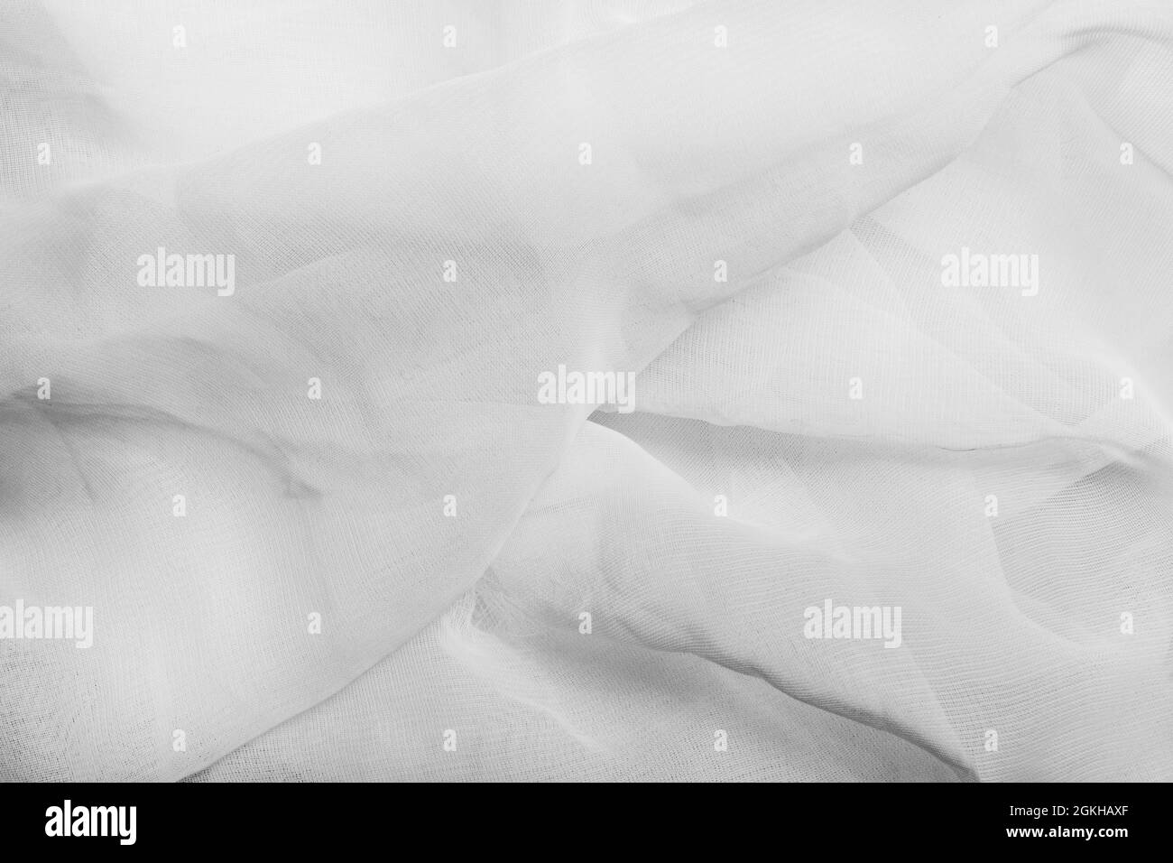 Texture sfondo foto di bianco rete piegata panno. Foto Stock