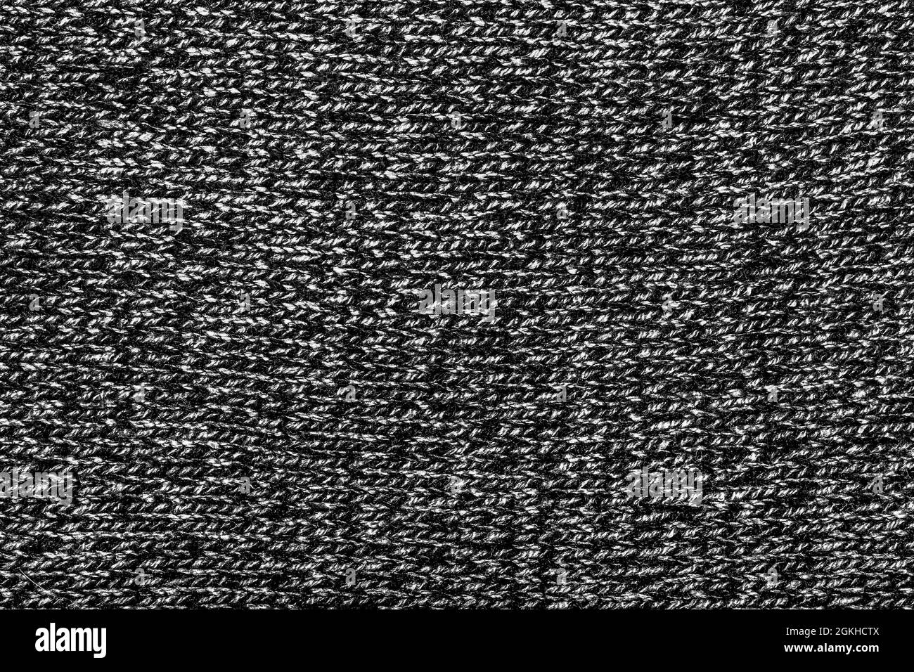 Texture sfondo foto di tessuto a maglia grigio. Foto Stock