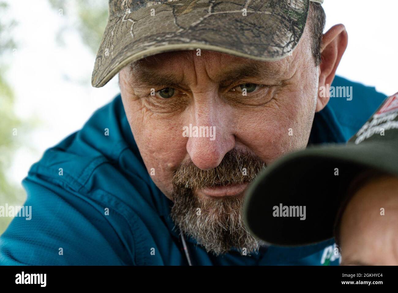 Keith Mangus, Applied Aquatics, project manager con 24 anni di esperienza nel campo e un amore per la fotografia della fauna selvatica è dedicato alla conservazione. Mangus, visualizza la piattaforma Spray Tracker sviluppata da Andrew Dew di FWC rileva e raccoglie il percorso di irrorazione degli applicatori autorizzati sul campo in tempo reale. Foto Stock