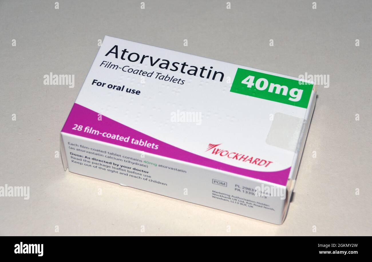 Una scatola di 28, 40mg compresse rivestite con film di Atorvastatin (Lipitor) 'Statin' fatte da Wockhardt prescritto per la riduzione del colesterolo, Inghilterra, Regno Unito. Foto Stock
