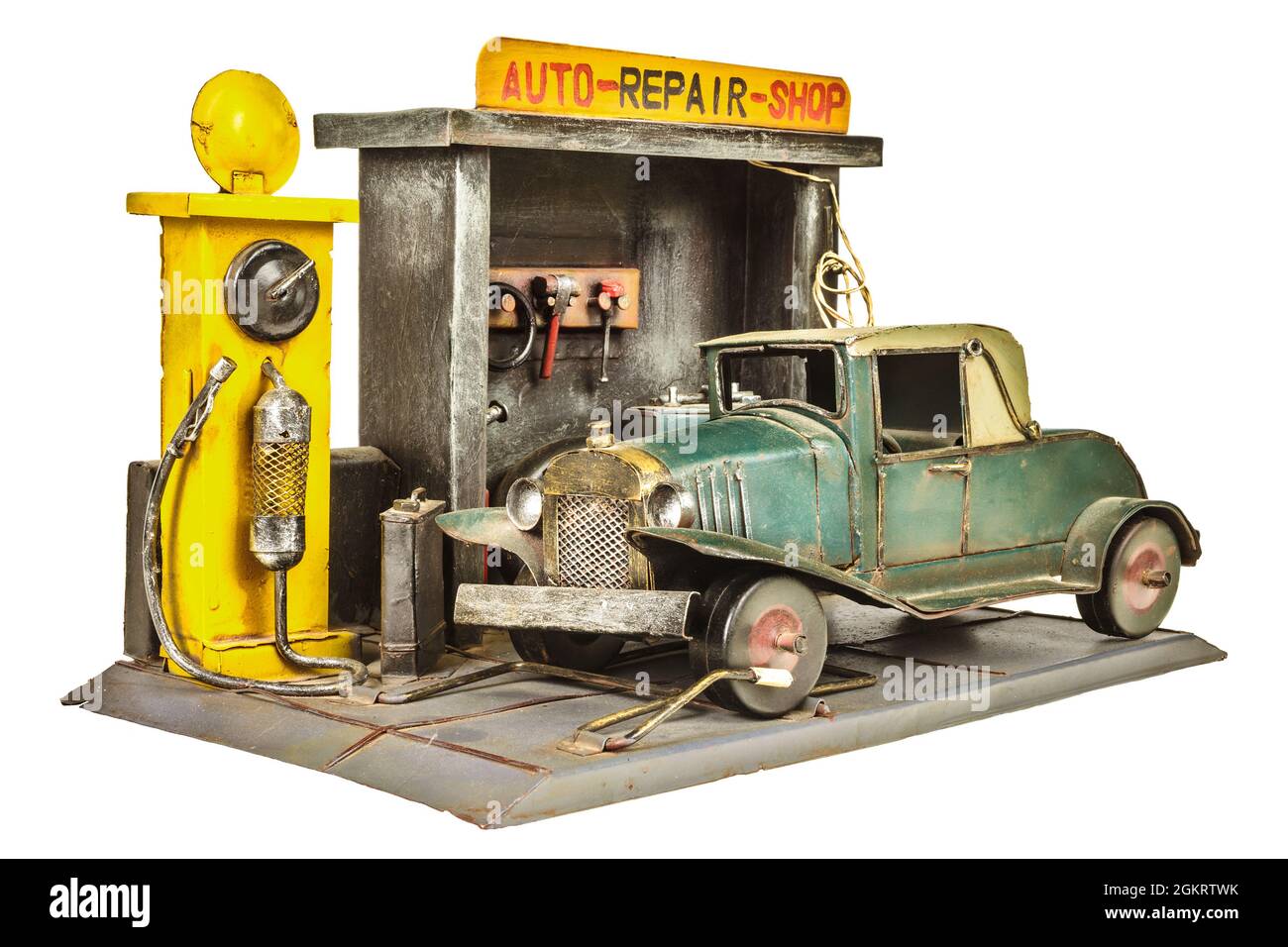 Negozio di riparazione auto giocattolo retro isolato su sfondo bianco Foto Stock
