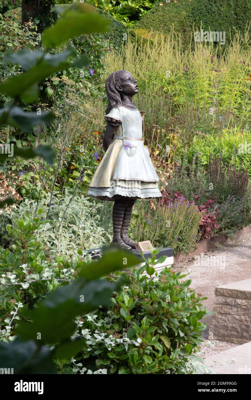 Robert James scultura Alice nel paese delle meraviglie Foto Stock