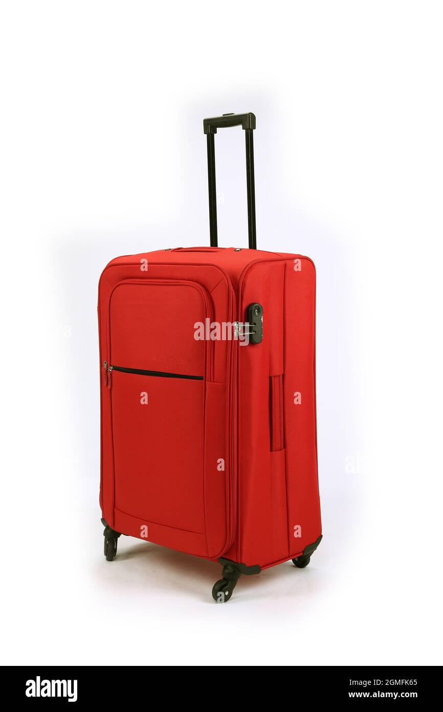 Bagaglio rosso isolato su sfondo bianco Foto Stock