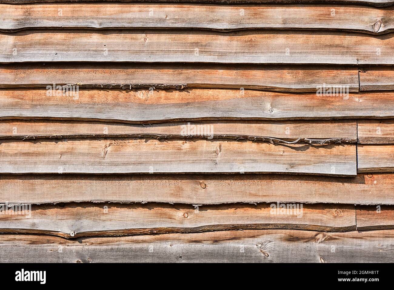 Sfondo da una parete fatta di tavole di legno Foto Stock