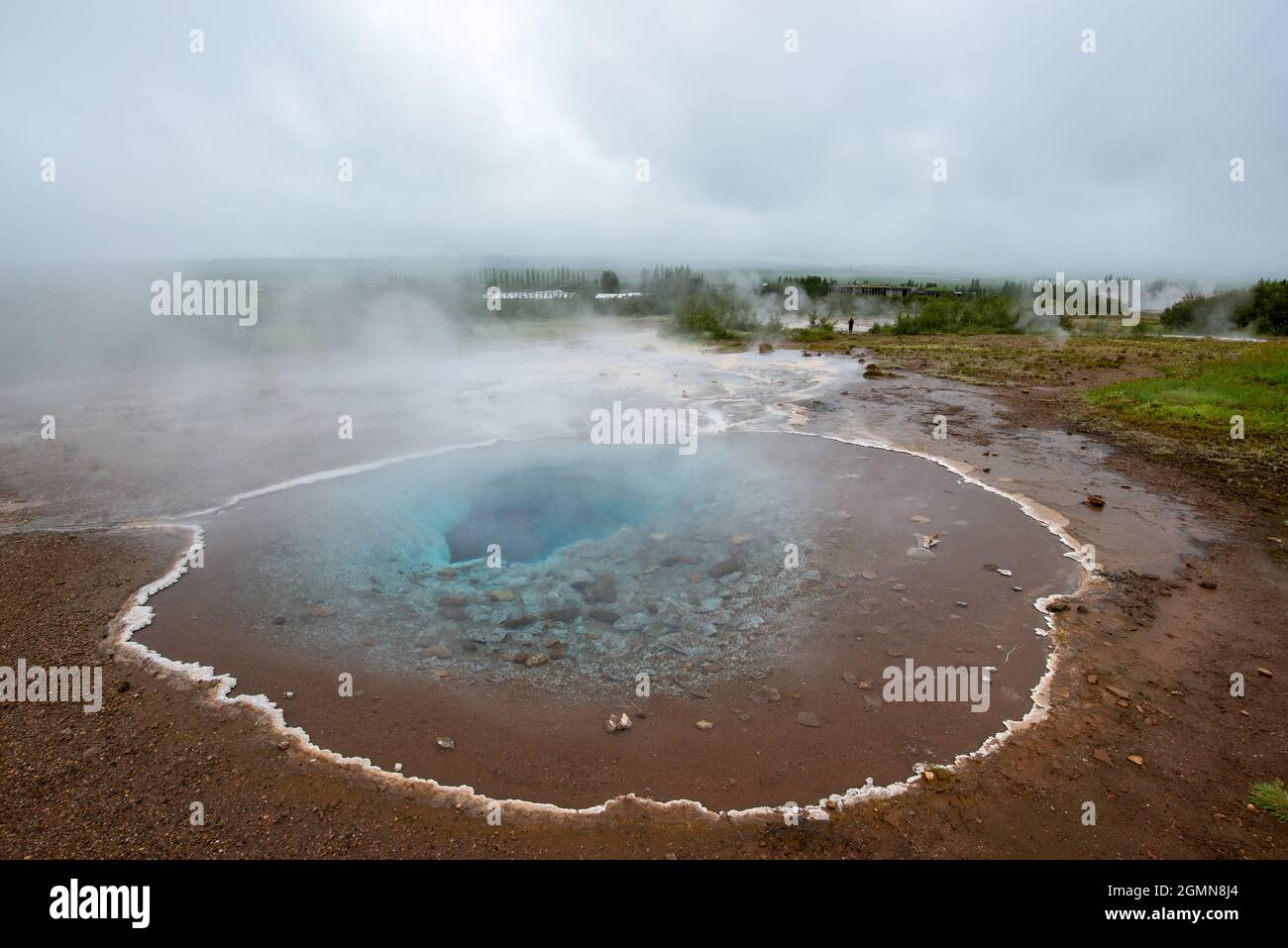 Sorgente termale nella zona geothemal di Geysir, Islanda Foto Stock