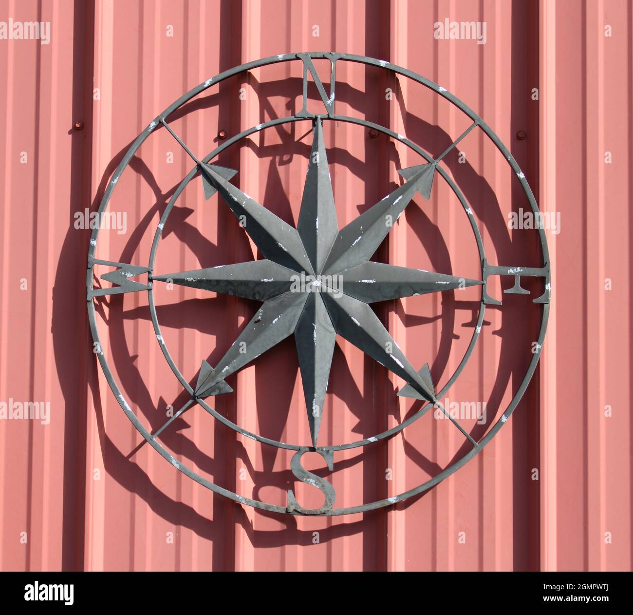 Paese vivente bussola stella sul fienile. Foto Stock