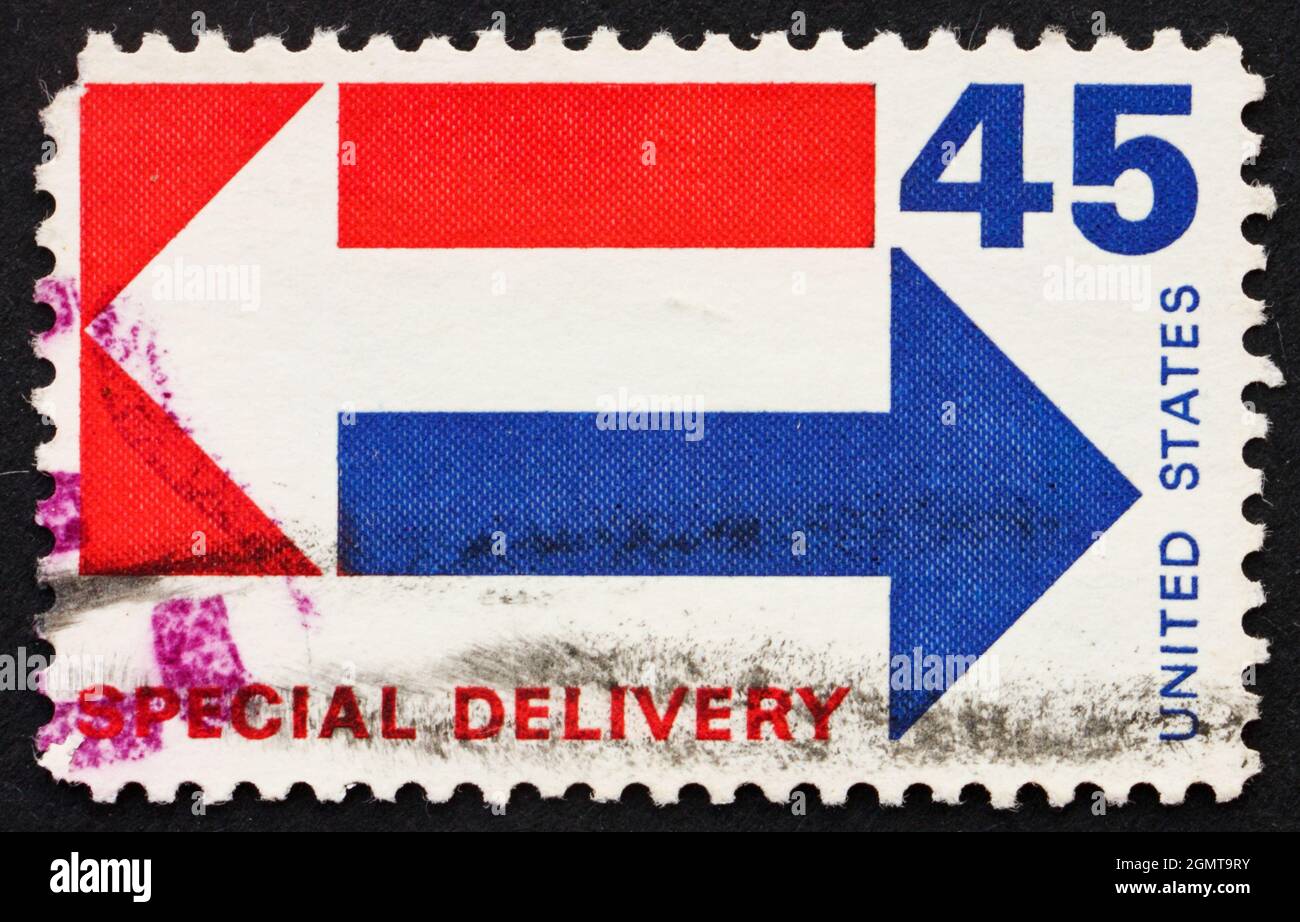 USA - CIRCA 1983: Un timbro stampato negli USA mostra frecce, consegna speciale, mano a mano, circa 1954 Foto Stock