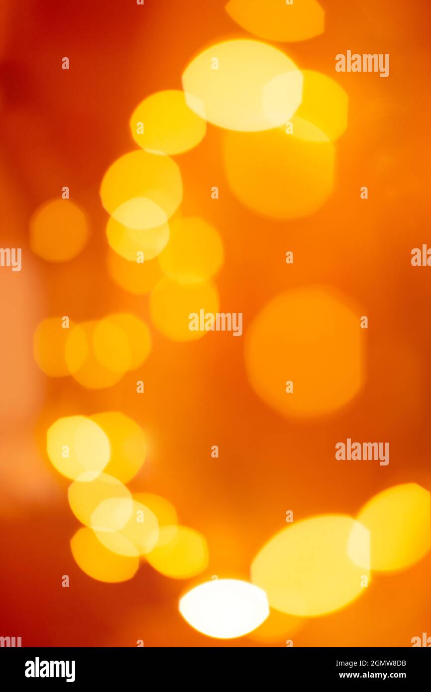 Bokeh arancione. Sfondo astratto. Brillante concetto autunnale. Foto Stock