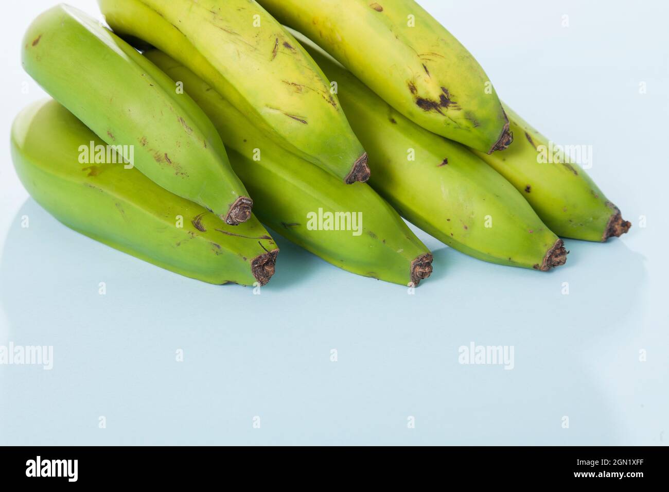 Banana verde biologico Delicious Tropical Fruit - Musa Paradiso Foto Stock