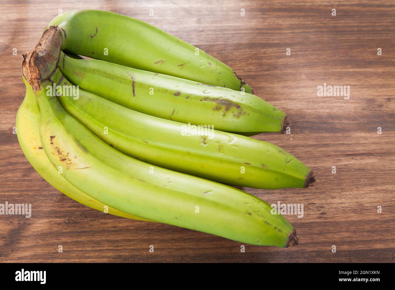 Banana verde biologico Delicious Tropical Fruit - Musa Paradiso Foto Stock